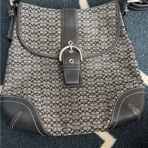 Black coach signature handbag. Like new. Used only handful of times.